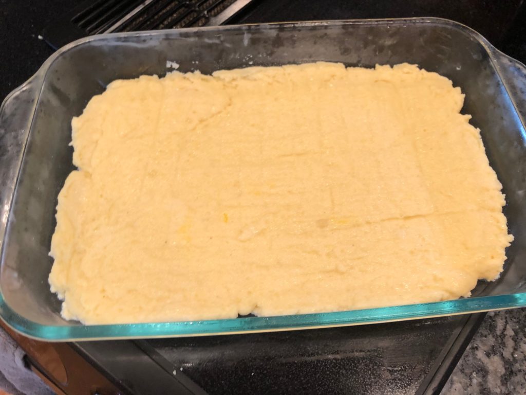 Gnocchi poured into baking dish